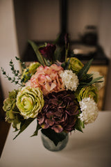 An eye catching abundance of hydrangea, ranunculus, anemone, lisianthus, viburnum and eucalyptus. Expertly arranged by our team of florists into a choice of light green ribbed glass vase or green bamboo glass vase or available as a beautifully wrapped bouquet.