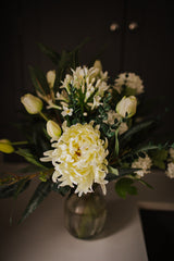 Luxury artificial white tulips, hydrangea, agapanthus and chrysanthemums mingled with the highest quality viburnum and eucalyptus. Expertly arranged by our team of florists into a choice of vases or available as a beautifully wrapped bouquet.
