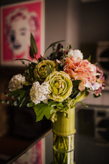 An eye catching abundance of hydrangea, ranunculus, anemone, lisianthus, viburnum and eucalyptus. Expertly arranged by our team of florists into a choice of light green ribbed glass vase or green bamboo glass vase or available as a beautifully wrapped bouquet.