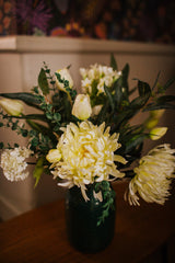 Luxury artificial white tulips, hydrangea, agapanthus and chrysanthemums mingled with the highest quality viburnum and eucalyptus. Expertly arranged by our team of florists into a choice of vases or available as a beautifully wrapped bouquet.