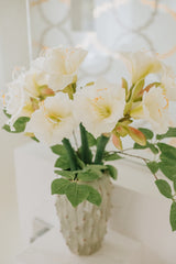 The white blooms of our artificial amaryllis are deceptively realistic in appearance and to touch.  Delivered in a vase or as a wrapped bouquet ready for the home or to gift.