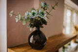 Our Ella bottle vase of sky blue nigella is utterly charming and guaranteed to add a touch of magic to any space.