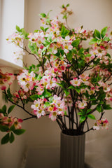 Realistic artificial Blossom flower arrangement in a chic off white vase perfect for the home or to gift.