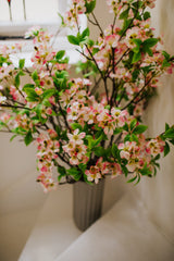 Realistic artificial Blossom flower arrangement in a chic off white vase perfect for the home or to gift.
