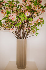 Realistic artificial Blossom flower arrangement in a chic off white vase perfect for the home or to gift.