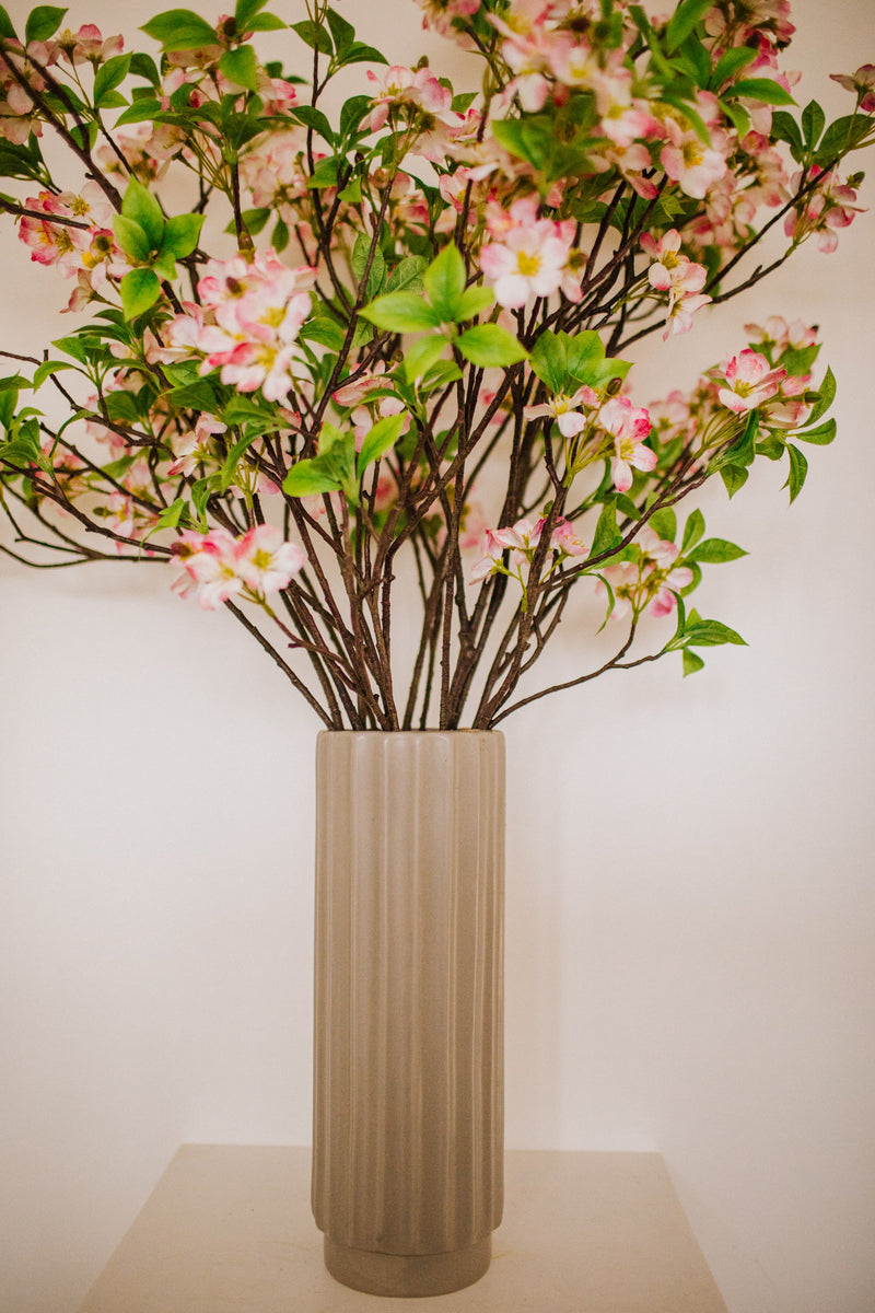 Realistic artificial Blossom flower arrangement in a chic off white vase perfect for the home or to gift.