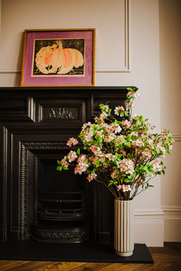Realistic artificial Blossom flower arrangement in a chic off white vase perfect for the home or to gift.